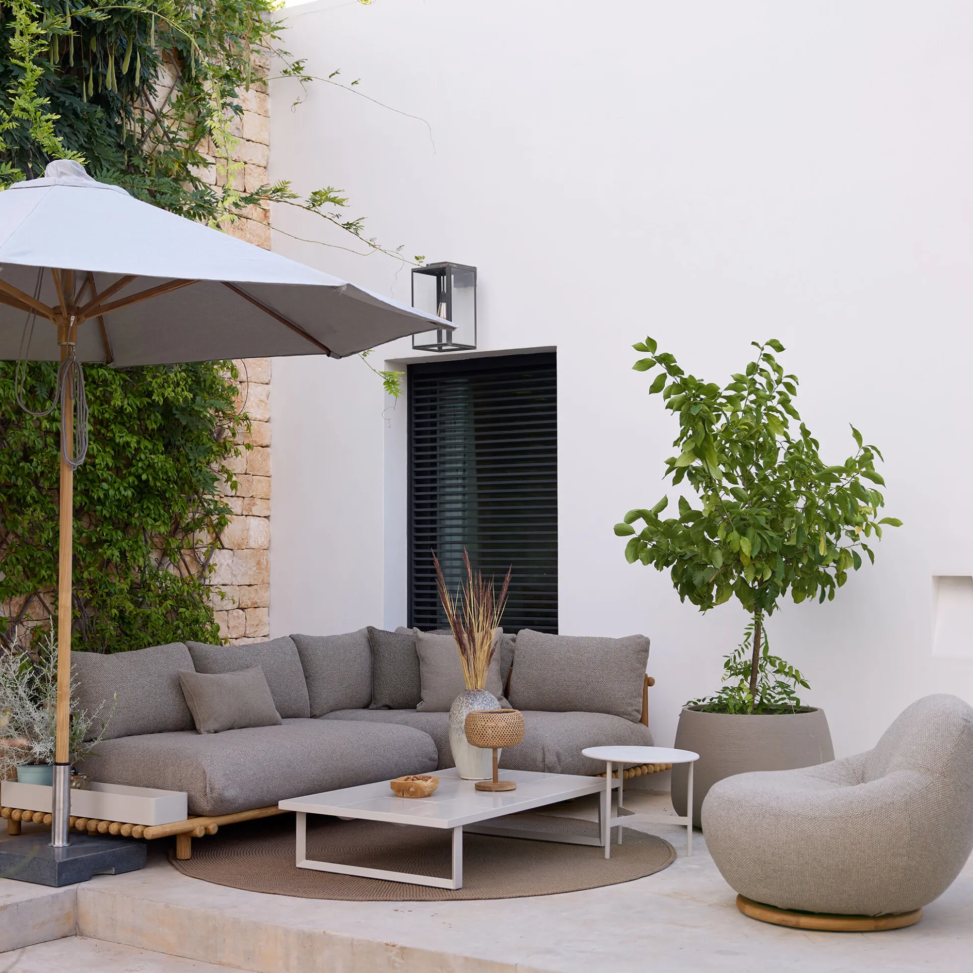 Gem loungestol med drejefod, light brown